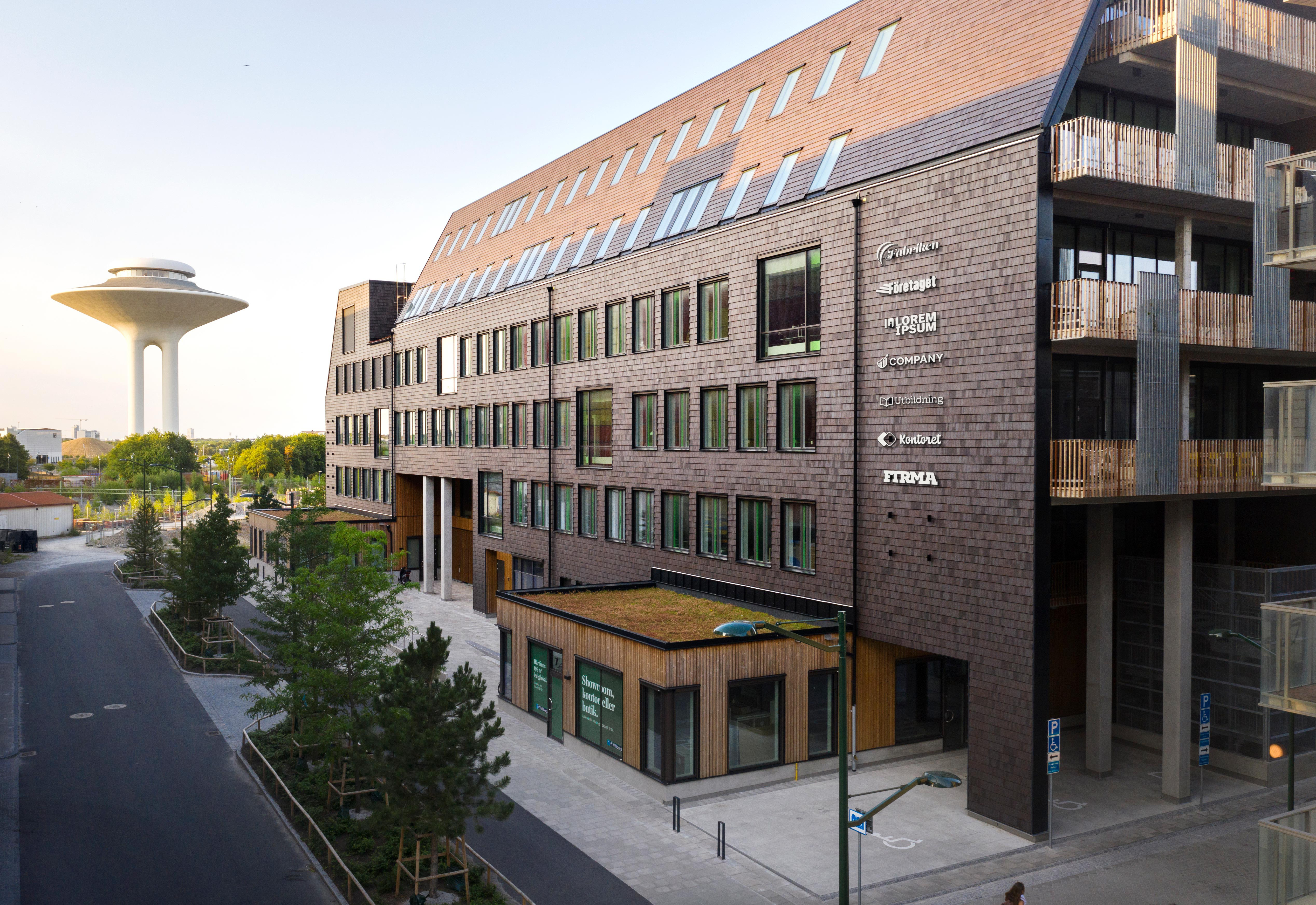 The brick and wood façade of the Origo property