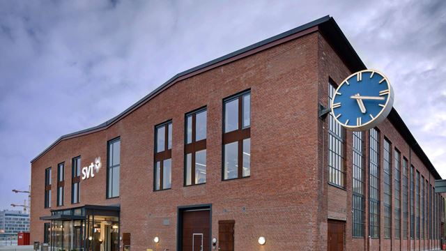 The SVT building in Dockan, Malmö. With the iconic blue clock from the Kockum's era intact.