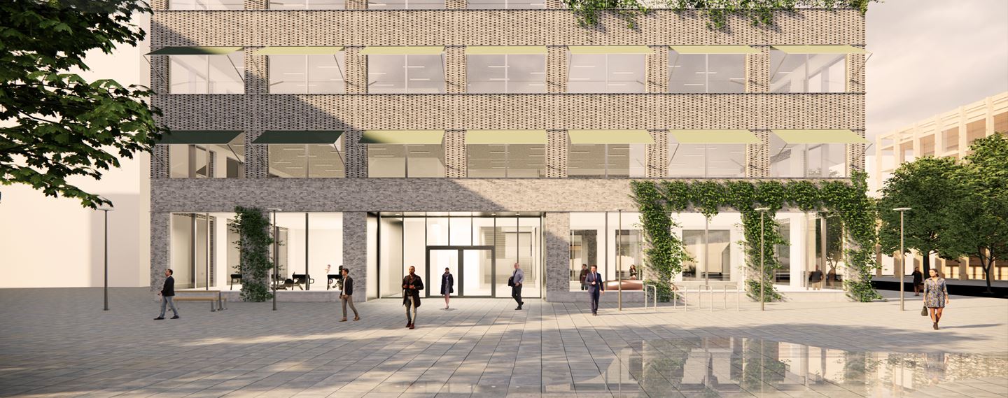 En hög tegelbyggnad med stora fönster, Spektra i Science Village.